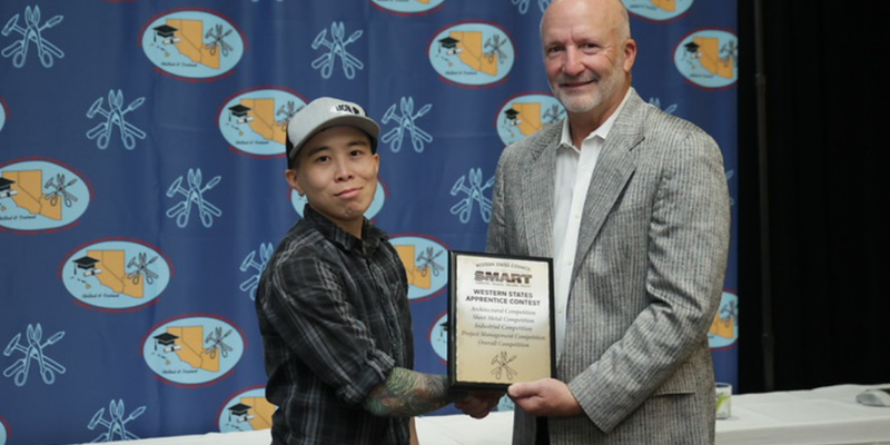 Image shows Rebecca Suen, sheet metal apprentice, receiving an award from SMACNA.