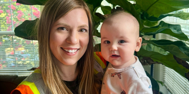 Ashley Bistline poses with her child, discussing work-life balance, returning to work after maternity leave, and our People First culture.