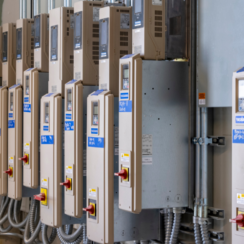 Installing variable frequency drives can be a result of the MEP commissioning process and included in a commissioning report.