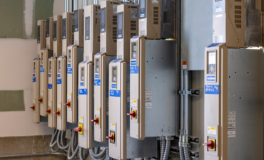 Installing variable frequency drives can be a result of the MEP commissioning process and included in a commissioning report.